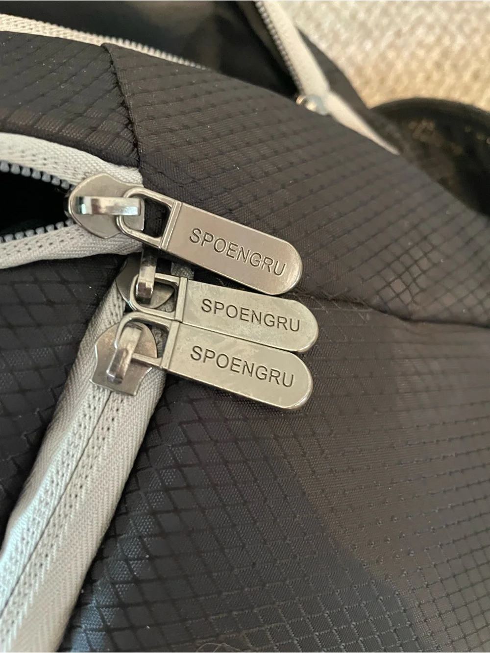 Spoengru Black Backpack with Gray Trim and Multiple compartments